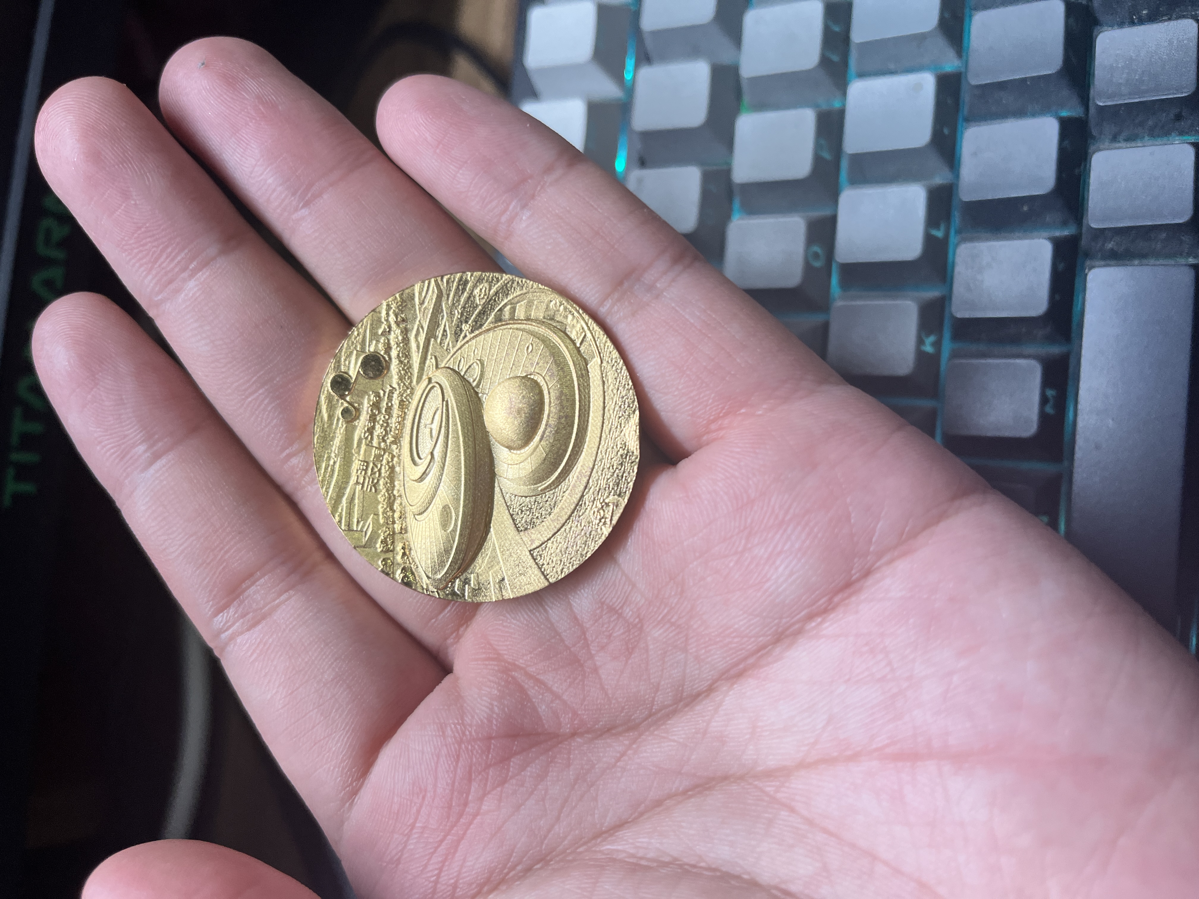 金币背面，天文馆标志